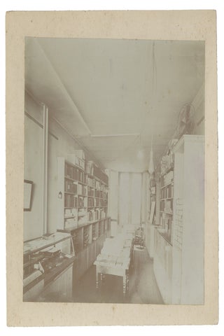 Circa 1900s Three Original Photographs of Interior of New York Scientific and Engineering Publisher Spon & Chamberlain; includes an Image of a Trade Show Booth advertising E. & F. N. Spon Publications.