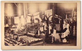Four photographs ca. 1890s of the Ocala Exposition in Florida showing Citrus County’s exhibits and a special fruit display.