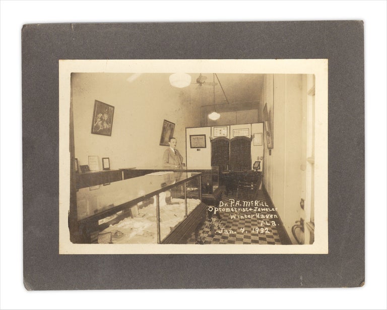 [3733286] 1932 Winter Haven, Florida photograph of the interior of an optometrist and jeweler. Unkwn.