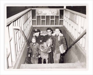 3733845] “Police Escort for Negro Children” [caption for 1962 UPI wire photograph]. UPI